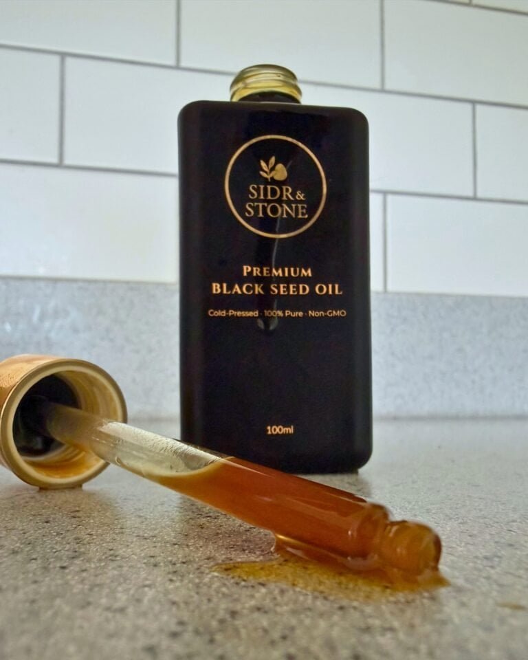 black seed oil bottle close up