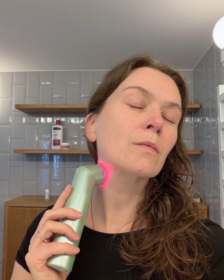 Nanoleaf light therapy wand red on neck