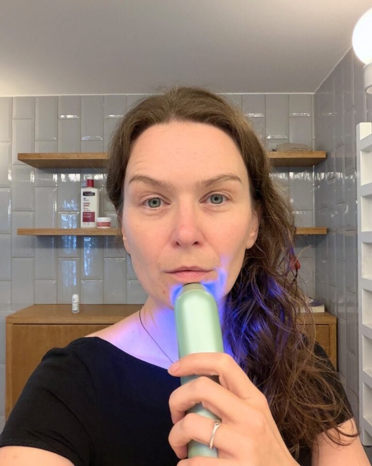 Nanoleaf light therapy wand using blue light on my chin