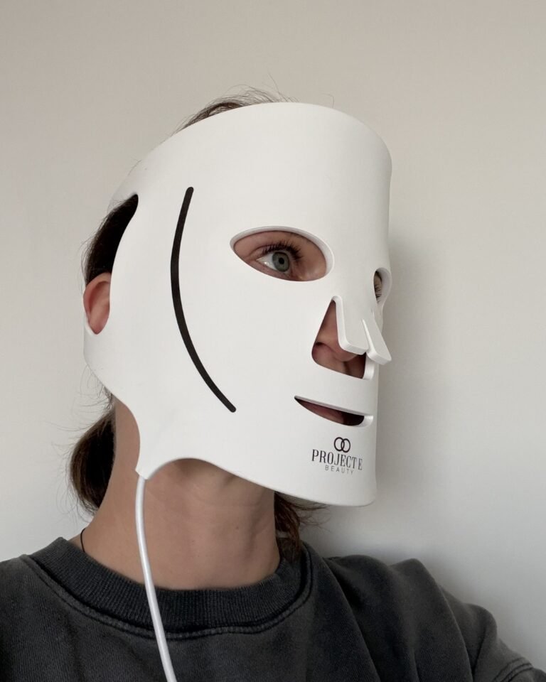 Project e LumaLux Face red light therapy mask on the face